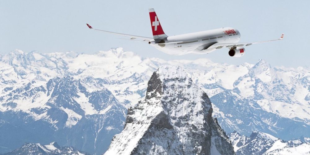 Swiss Airplane flying over the Matterhorn